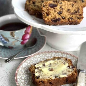 buttered slice of fruit loaf and cup of tea.