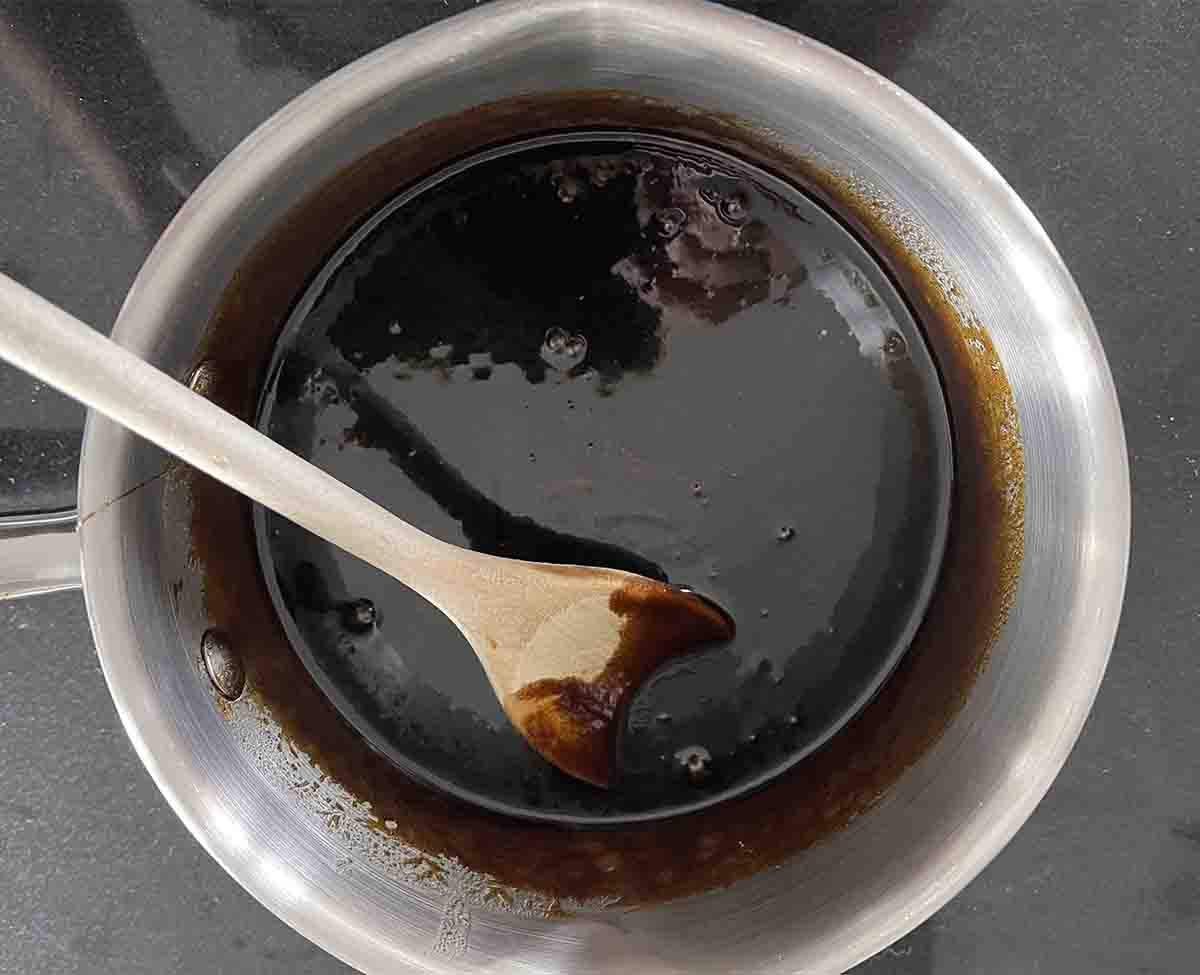 syrup, treacle and sugar melting in a saucepan.