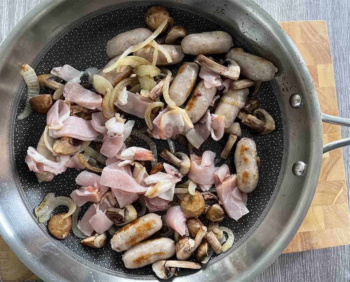 sausages with bacon and mushrooms added.