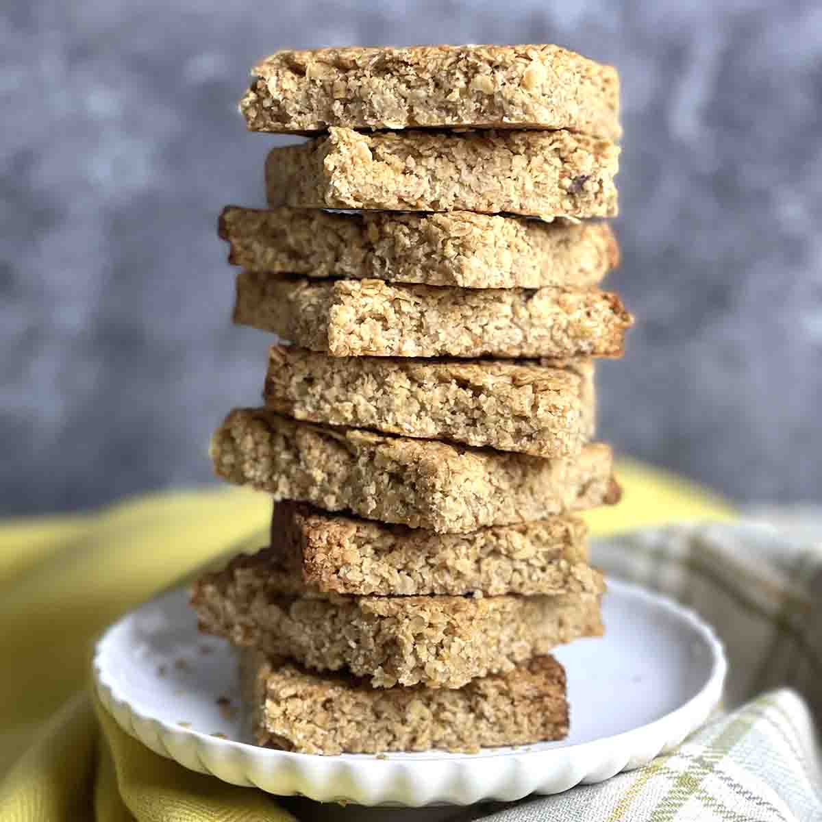 flapjack squares in a pile on a plate.