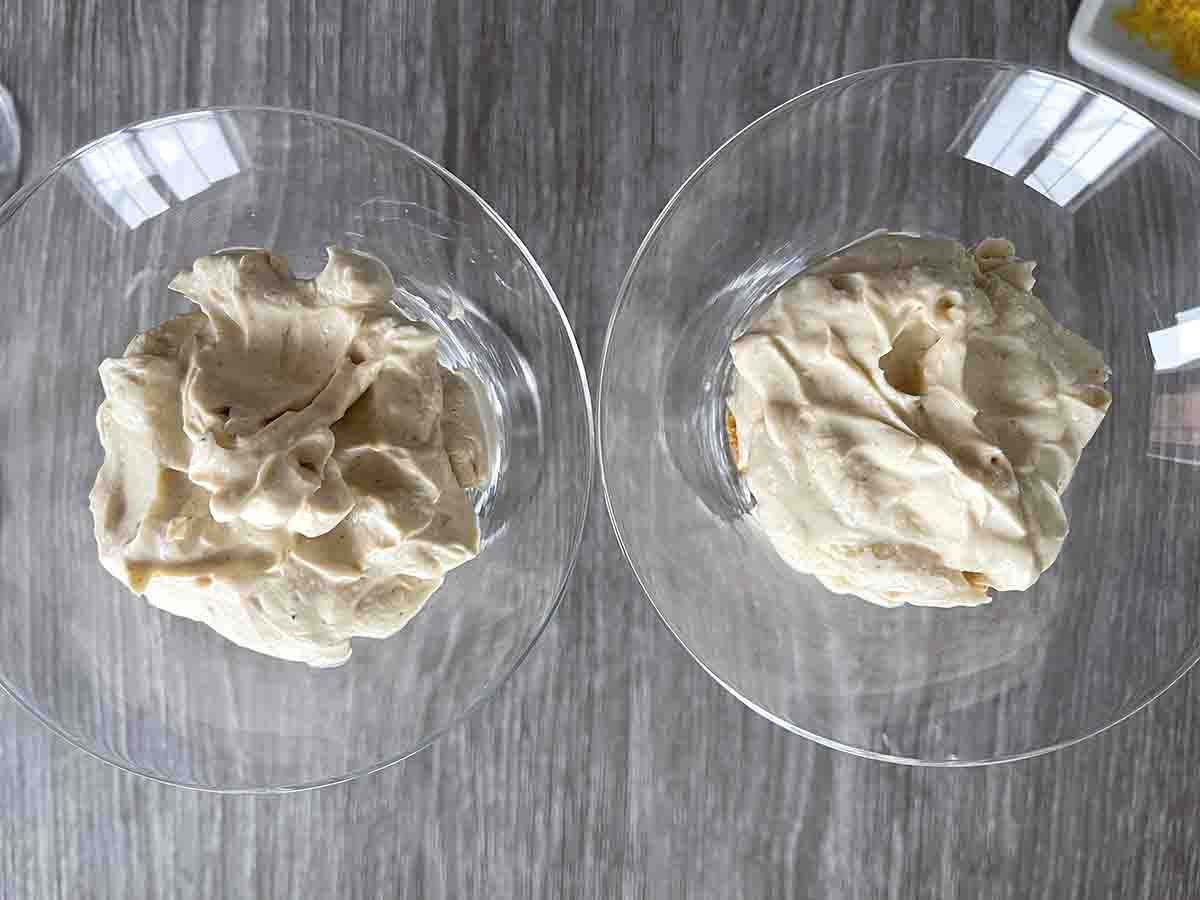 glasses topped with old english syllabub.