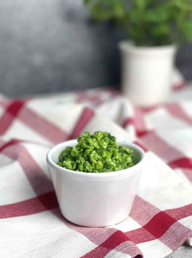 mashed peas in a dish.
