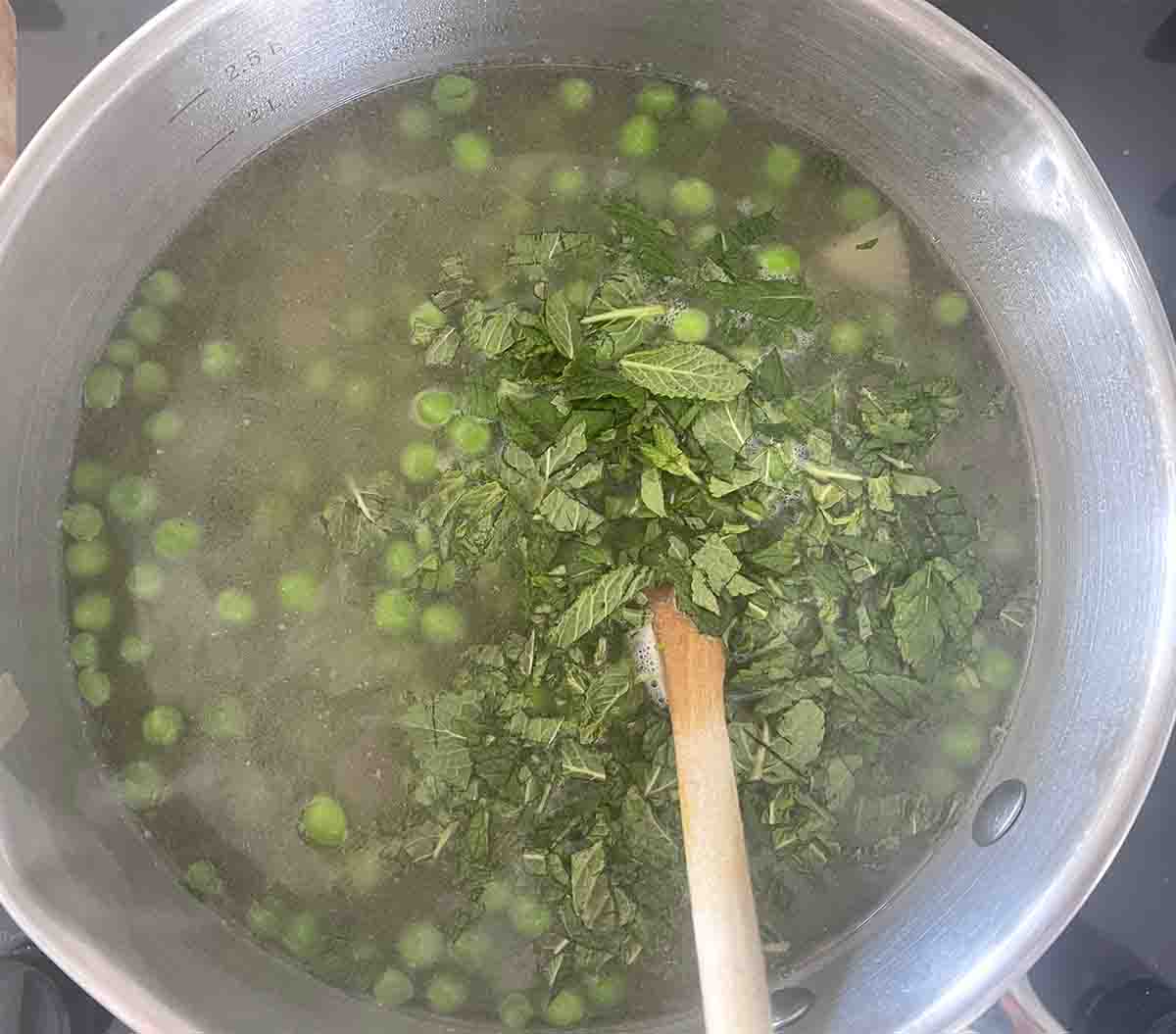 peas added to the saucepan.