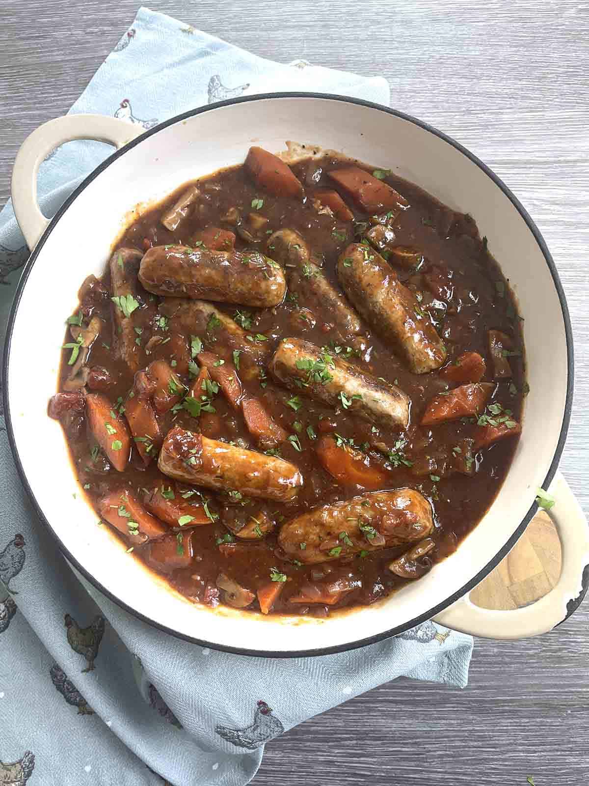 slow cooker sausage casserole in a serving dish.