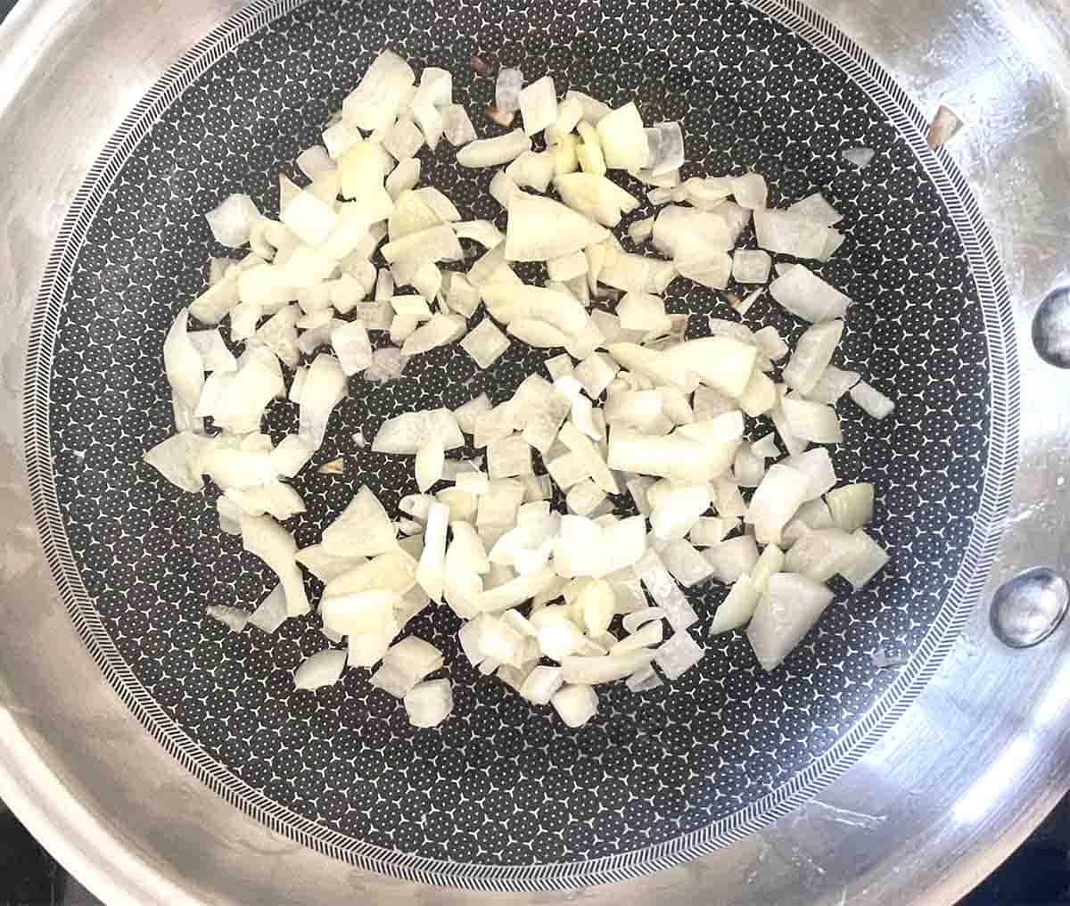 onion in a frying pan.