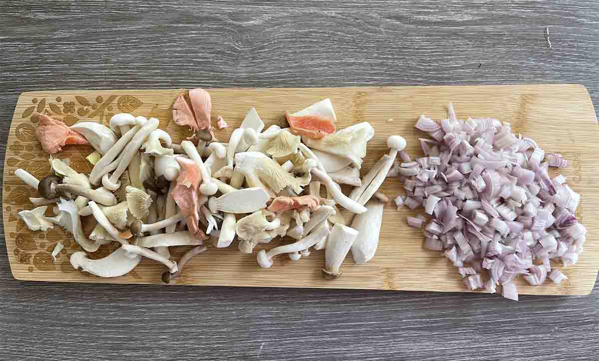 chopped mushrooms on a board.