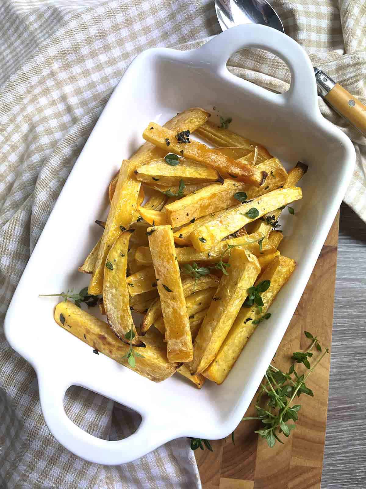 honey roast swede chips in a dish.