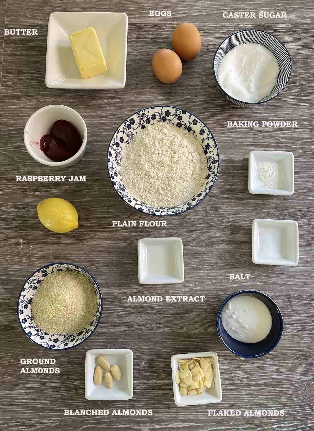 ingredients including flour, sugar, eggs, butter, ground almonds, baking powder, salt and lemon.
