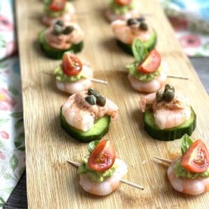 prawn canapes on a board.