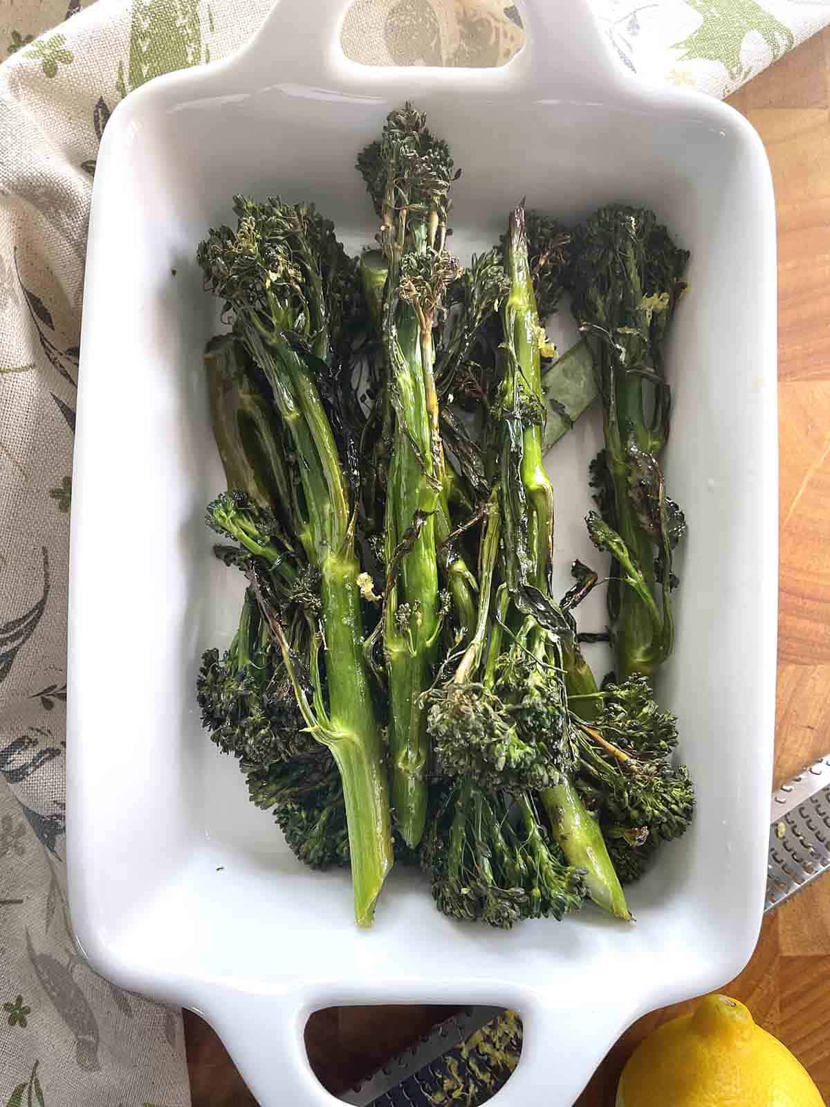 roasted broccolini in a dish.