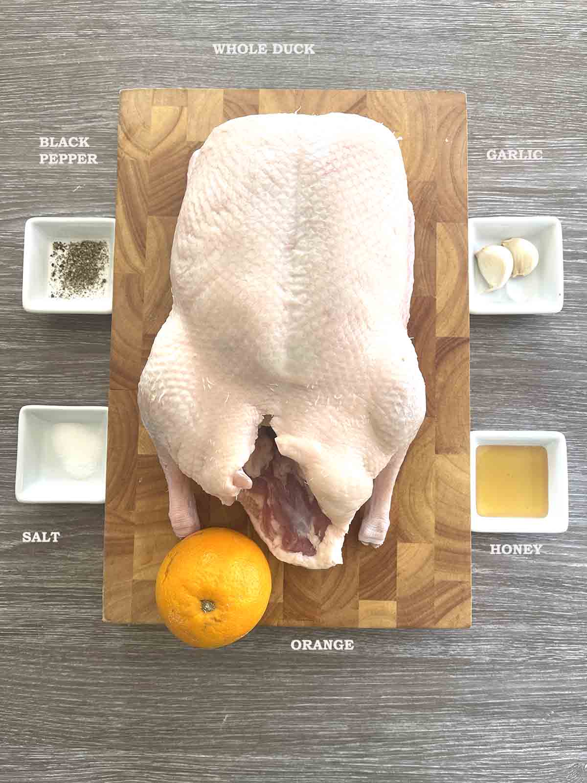 ingredients including duck, orange, honey, garlic and seasoning.