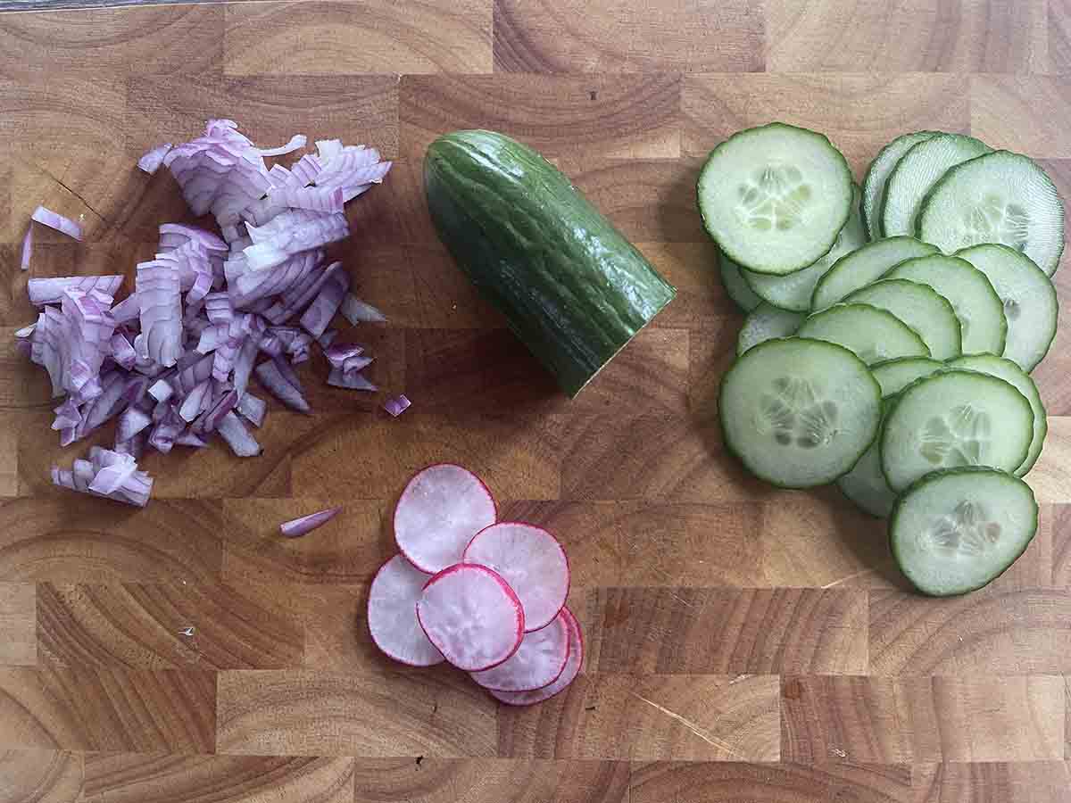 chopped vegetables on a board.