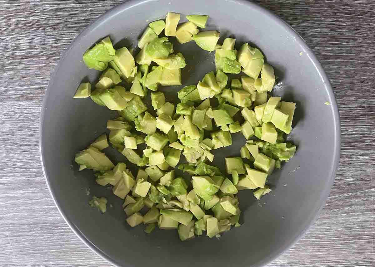 chopped avocado in a bowl.