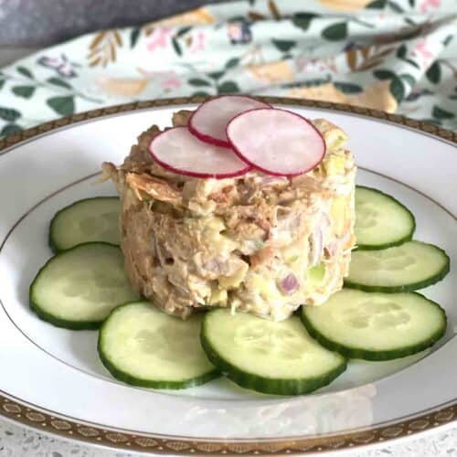 spicy crab salad on a bed of cucumber.