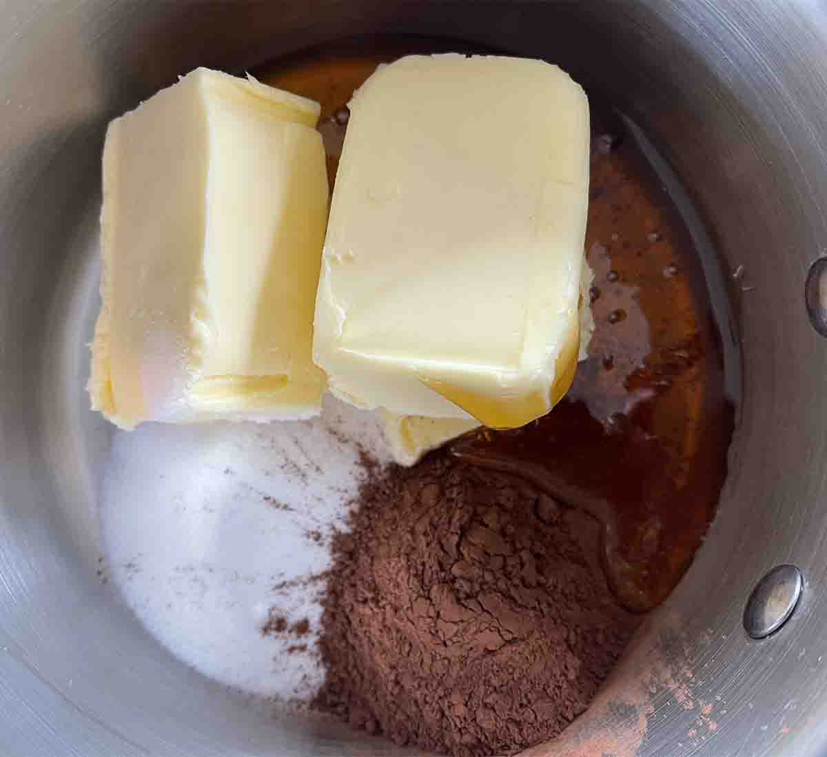 butter, sugar and cocoa in a pan.