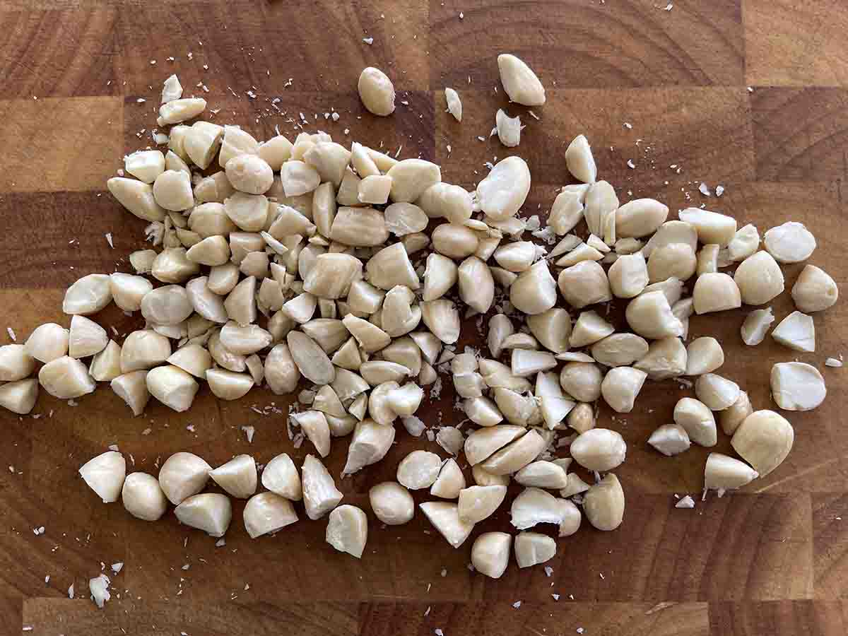 chopped almonds on a board.