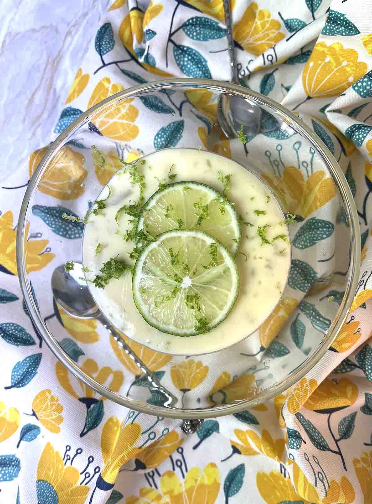 lime posset in a glass dish.
