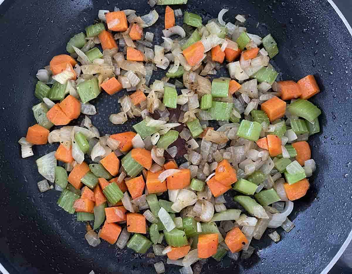 vegetables softening in the pan.