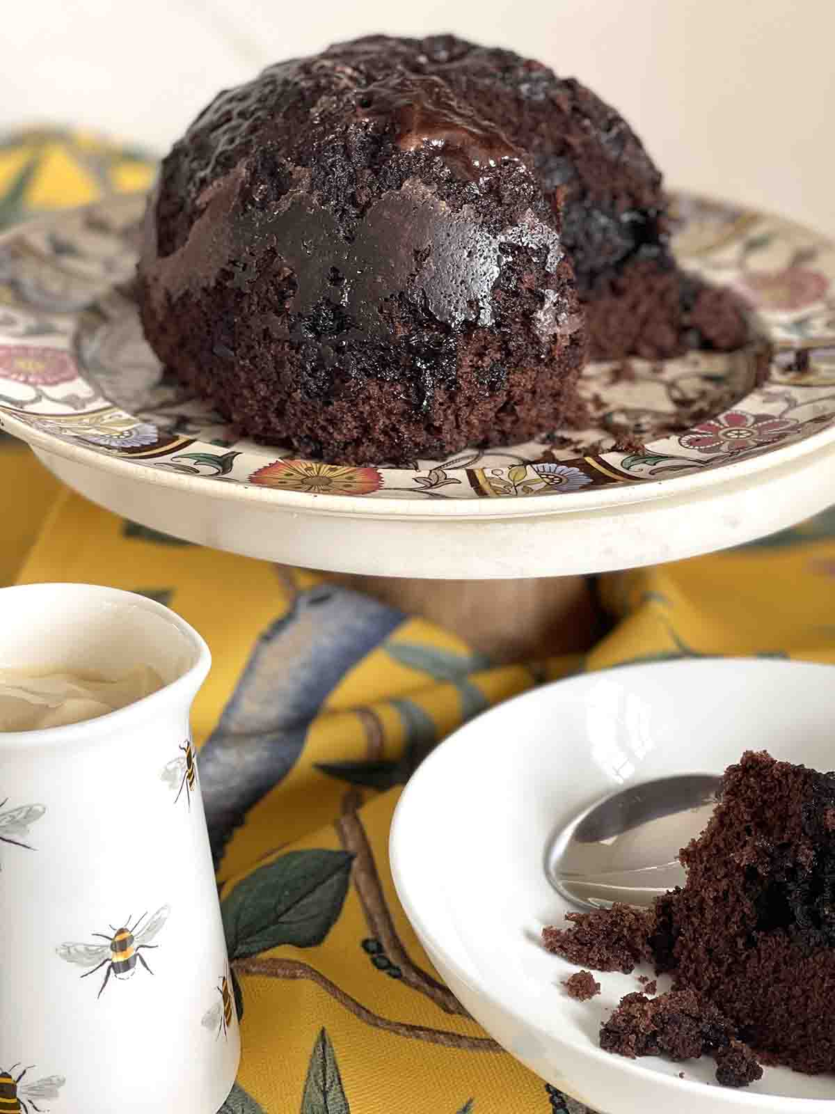 microwave chocolate cake served with slice taken out.