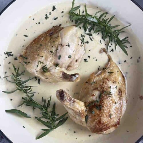 roast chicken supreme in a pan.