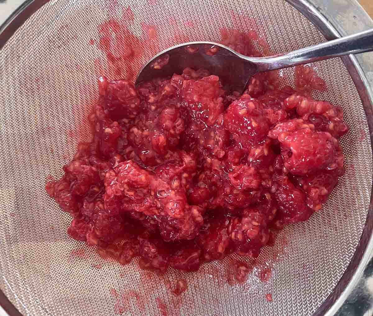 raspberries pushed through a sieve.