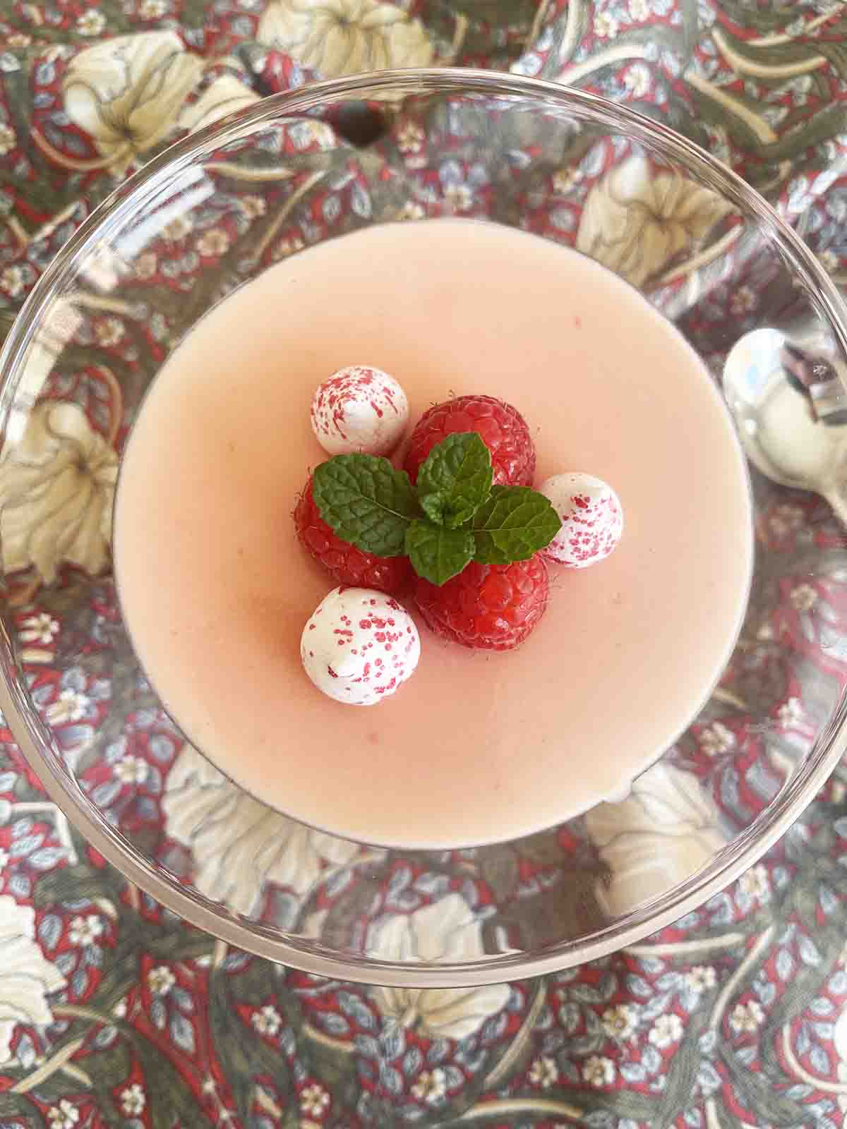 raspberry posset in a glass.