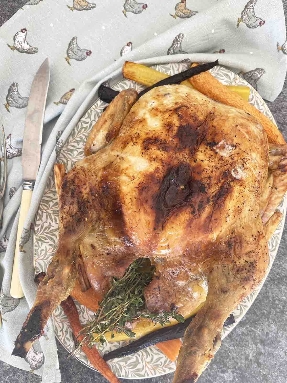 roast rooster on a platter.