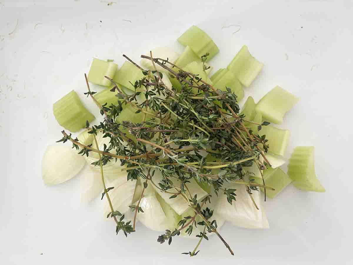 chopped vegetables in a roasting dish.