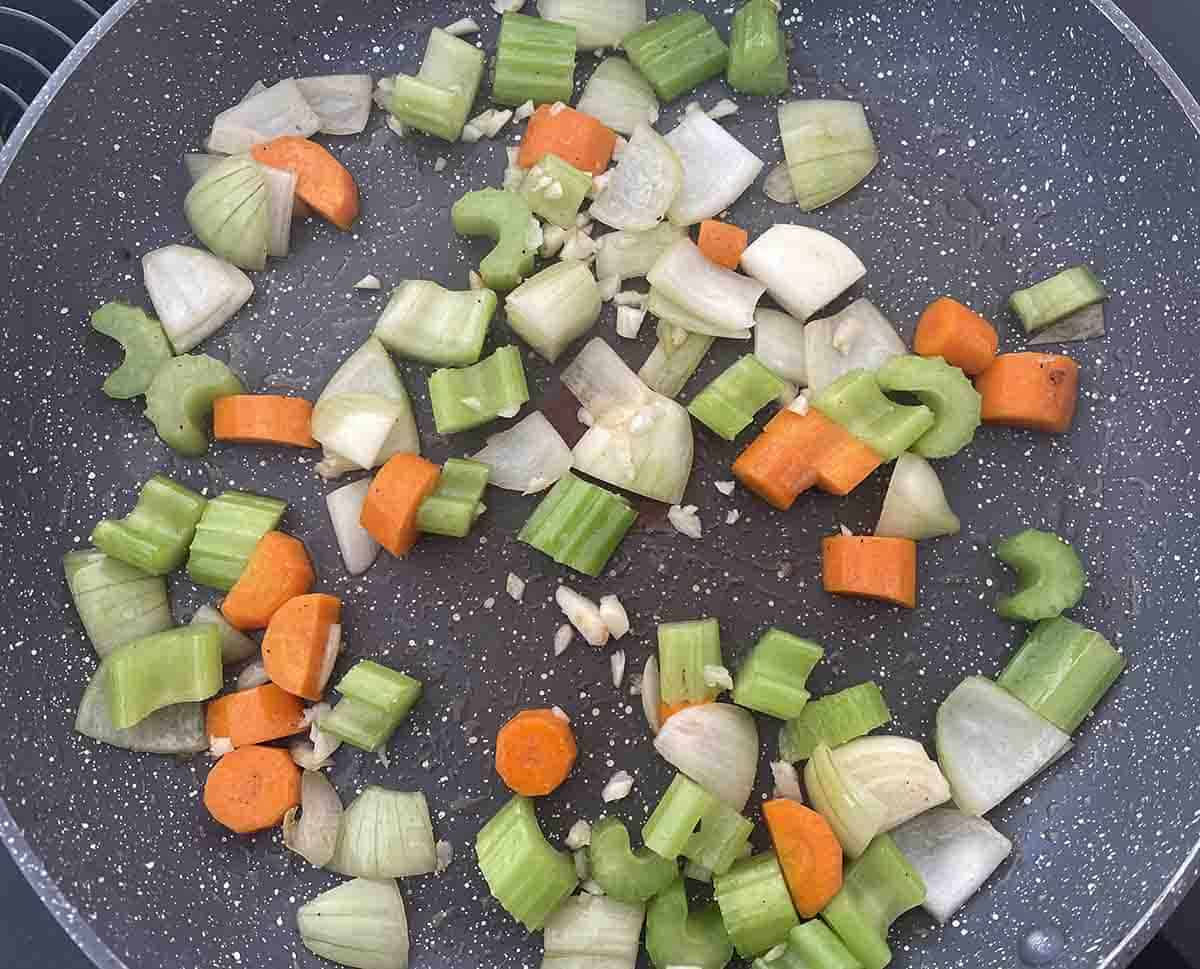 vegetablers softening in a pan.